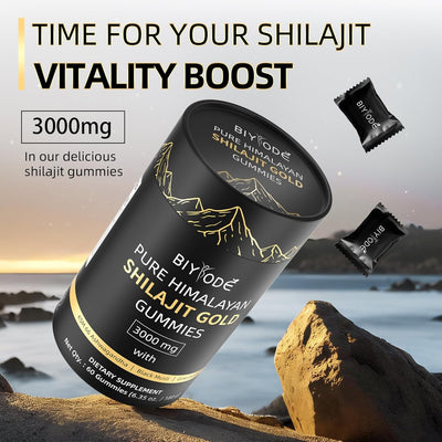 "Person taking a Shilajit Gummy in the morning with 
tea and supplements on a wellness tray.